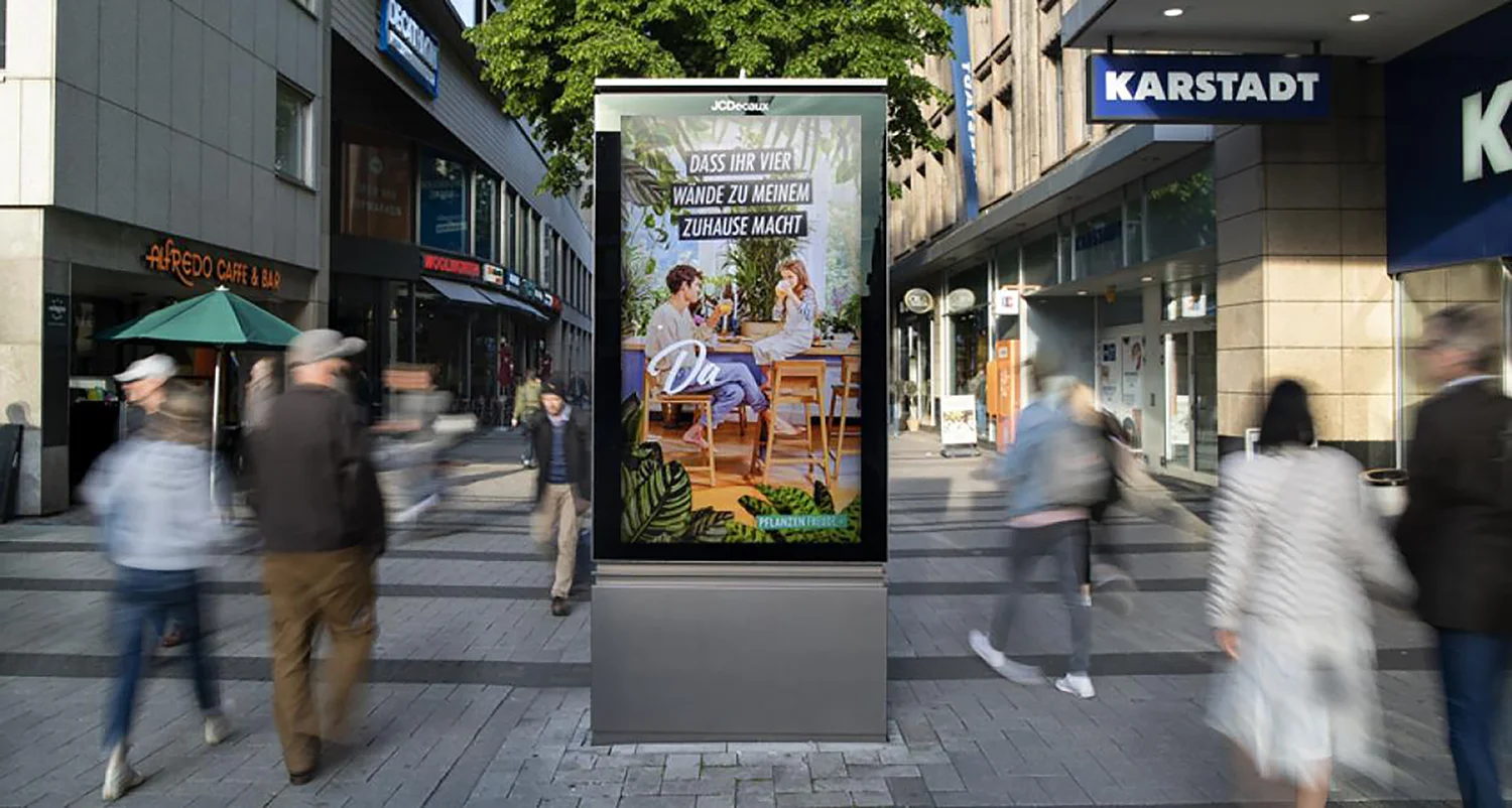 Digital City Light Poster mit Werbung für einen Floristen.